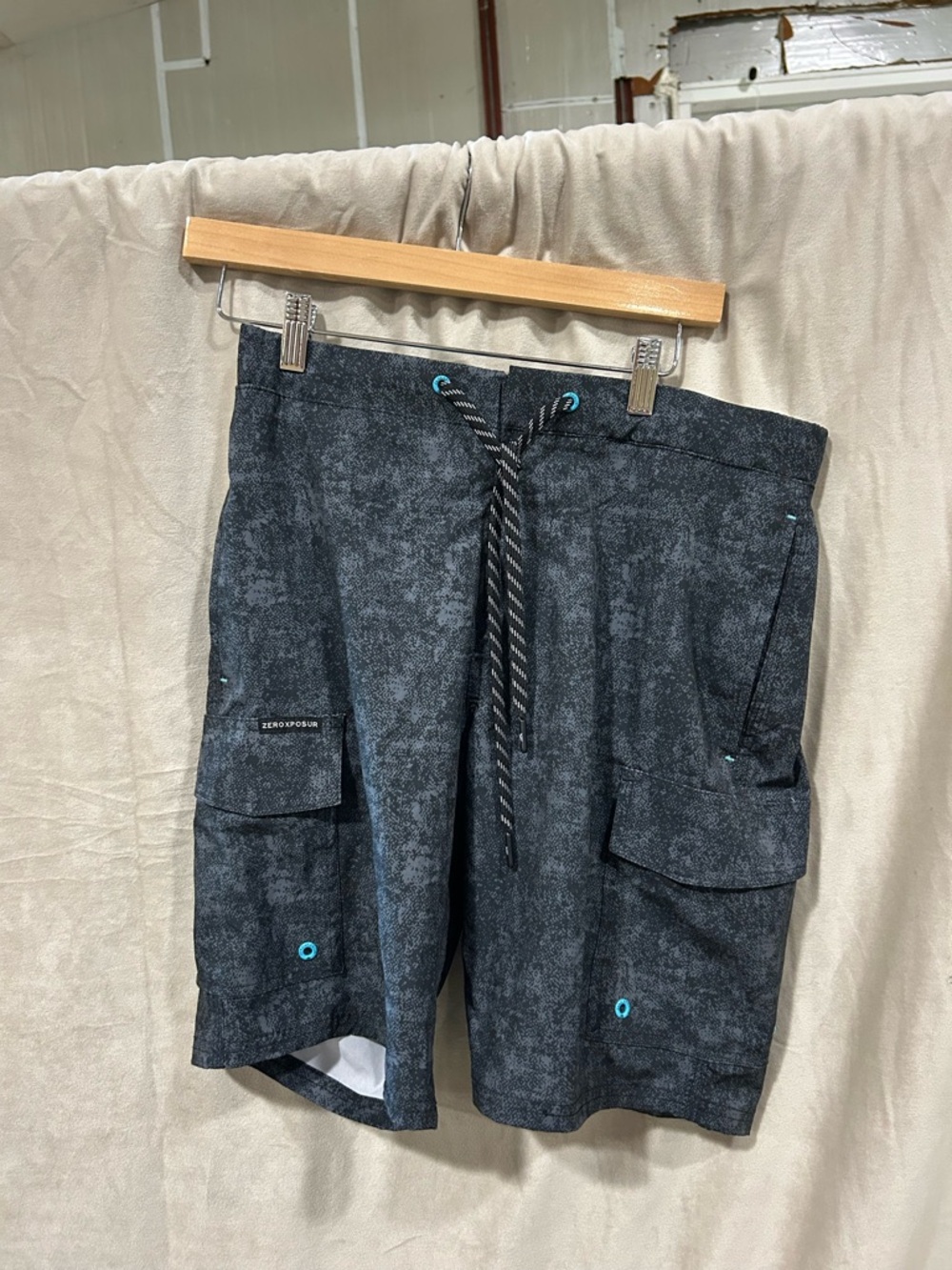 ZeroXposur Black Cargo Swim Shorts with Teal Accents